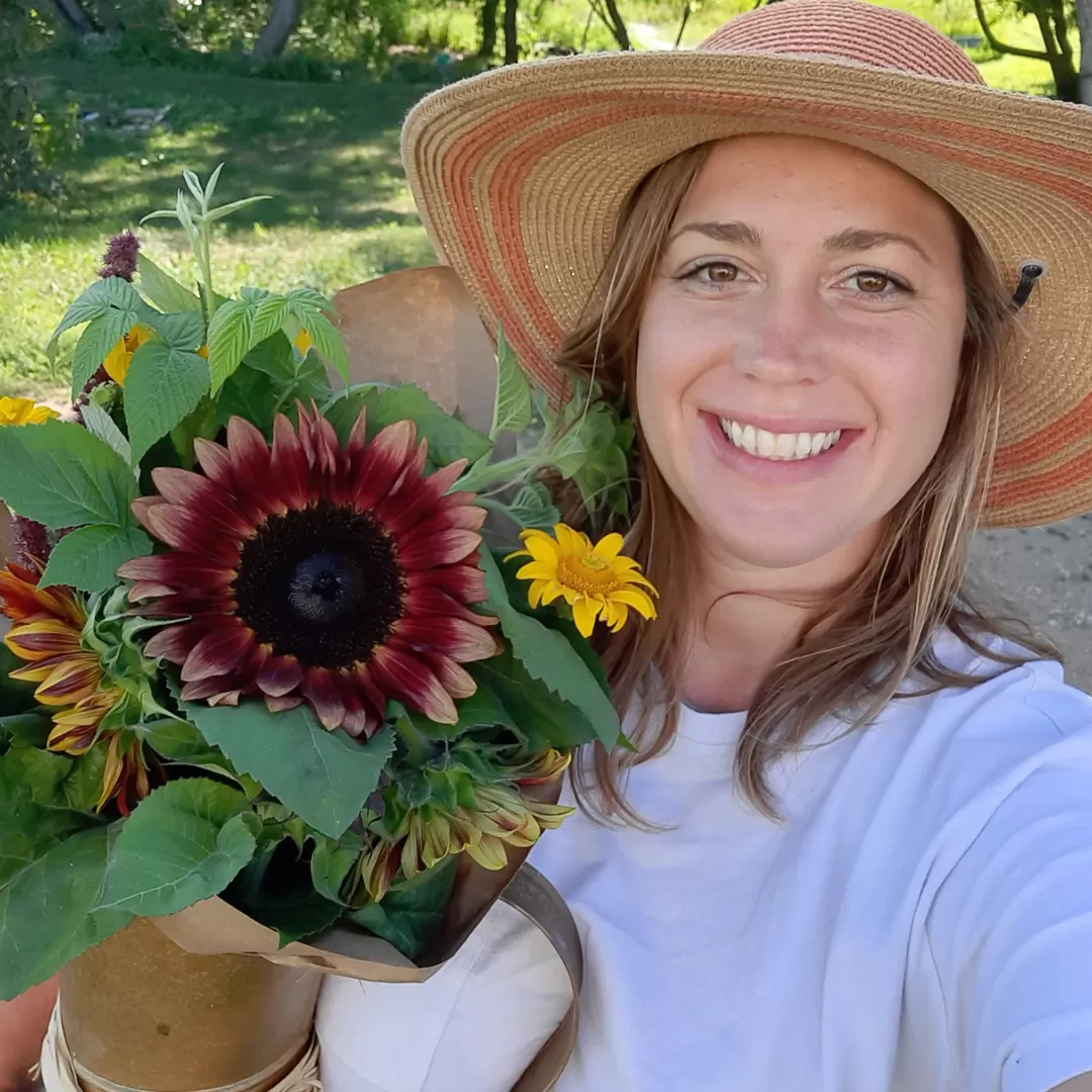 woman holding flowers