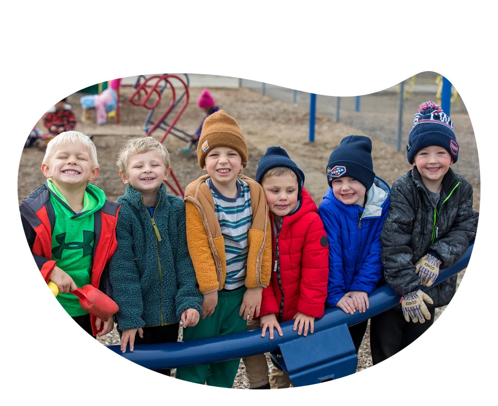 preschoolers playing on a playground