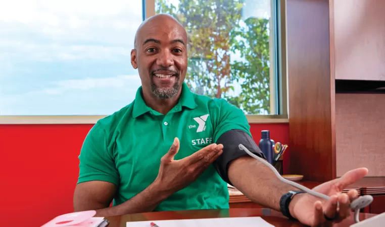 man checking his blood pressure