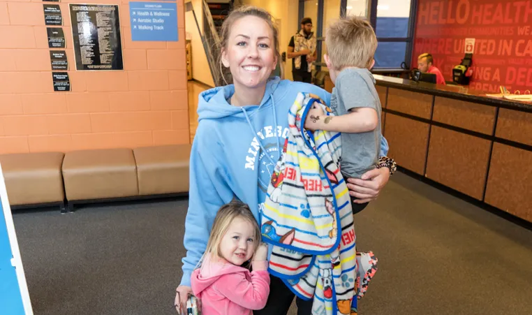 woman with 2 children at YMCA Child Care Center