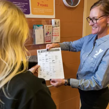 woman displaying a schedule 
