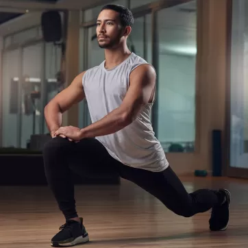 man doing a lunge stretch