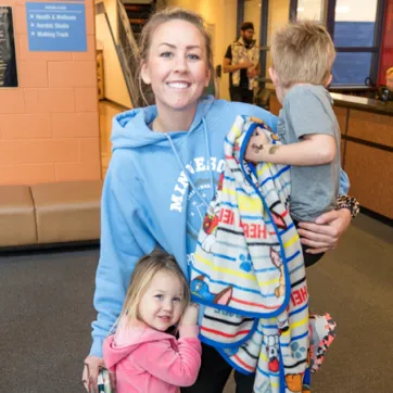 woman with 2 children at YMCA Child Care Center