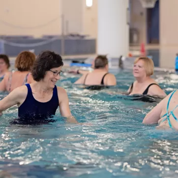 seniors in a water aerobics class