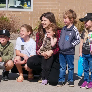 smiling group outside the YMCA