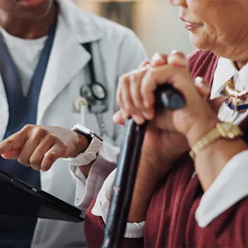 Doctor working with a senior woman